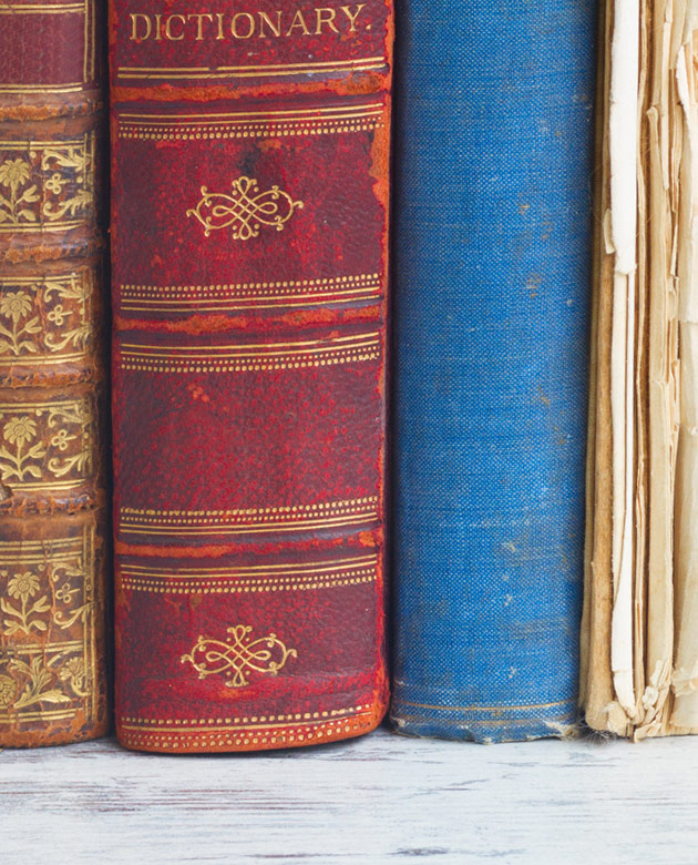 Hardbound books on a shelf